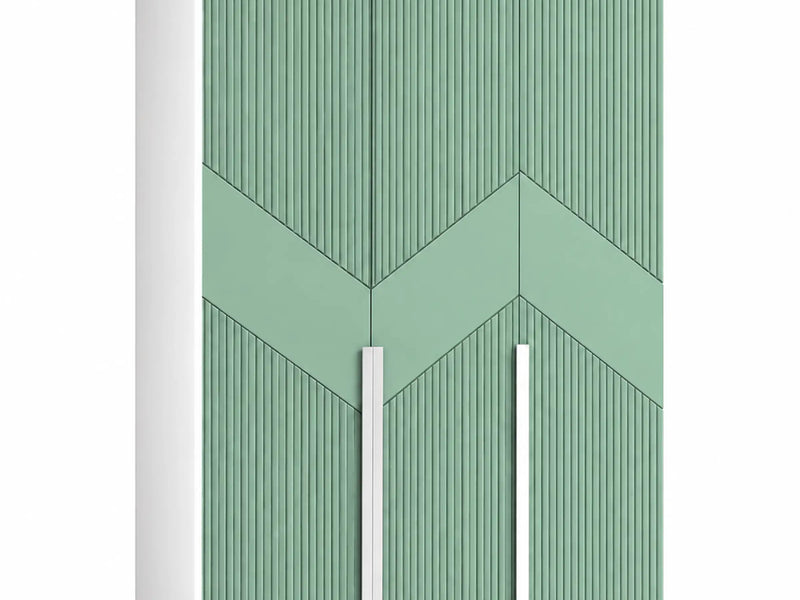 Green and white storage wardrobe with fluted doors, a chevron pattern and long white handles.