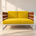 Cozy sofa with yellow cushions and white frame, front view