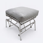 Modern Relaxo recliner chair with ottoman, grey cushion and chrome frame for home lounge comfort and stylish seating set