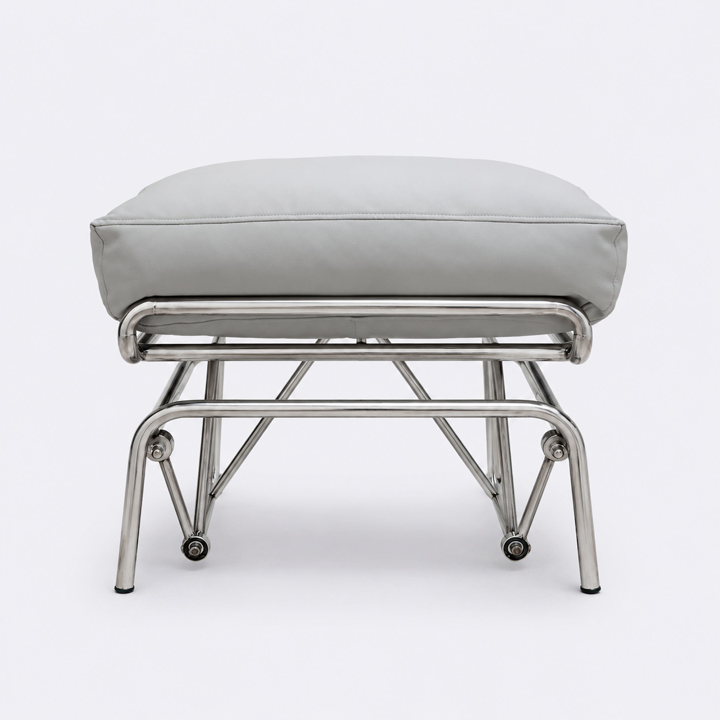 Relaxo cushioned recliner chair and footstool, premium grey lounge chair for relaxing, reading, and TV watching at home.