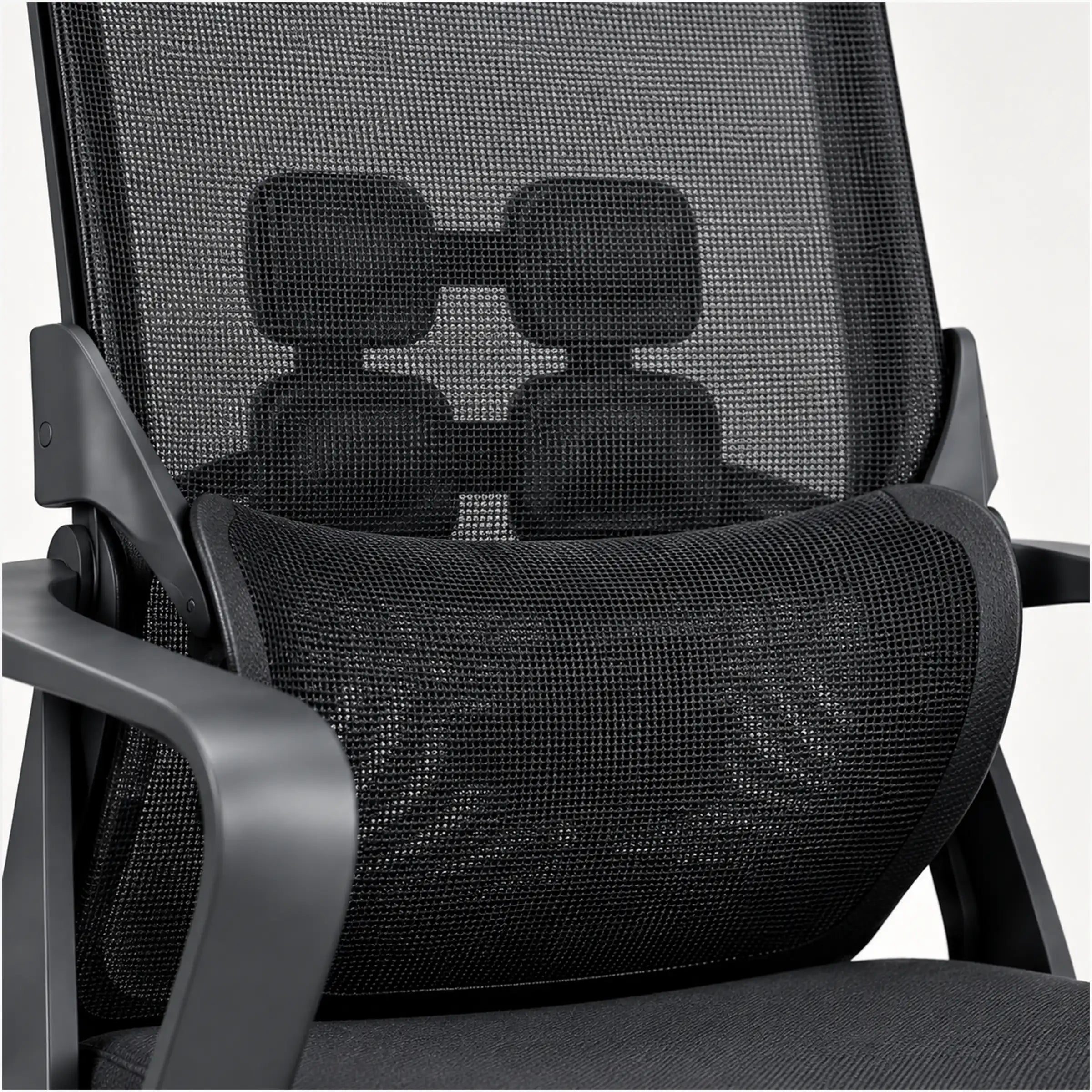 Close-up of a black mesh office chair showing the backrest, lumbar support cushion, armrests, and seat fabric against a light gray background.