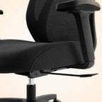 Aster executive chair armrest, seat and adjustment-control detail