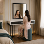 Bangladeshi woman using Crystal dressing table with mirror and teal stool in a luxury bedroom