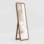 Contemporary rotatable dressing mirror with slim wooden frame for luxury living room interior styling