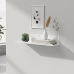 Minimalist white metal wall decor shelf, ideal for organizing books, plants, or decorative items in any modern space.