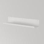 Powder-coated white wall shelf with 600mm width, ideal for organizing and enhancing room decor.