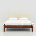 Enora King Size Bed with modern minimalist design, upholstered backrest and strong wooden frame for contemporary bedrooms.