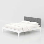 Enora King Size Bed featuring a comfortable fabric backrest and elegant wooden finish for a modern master bedroom setup.