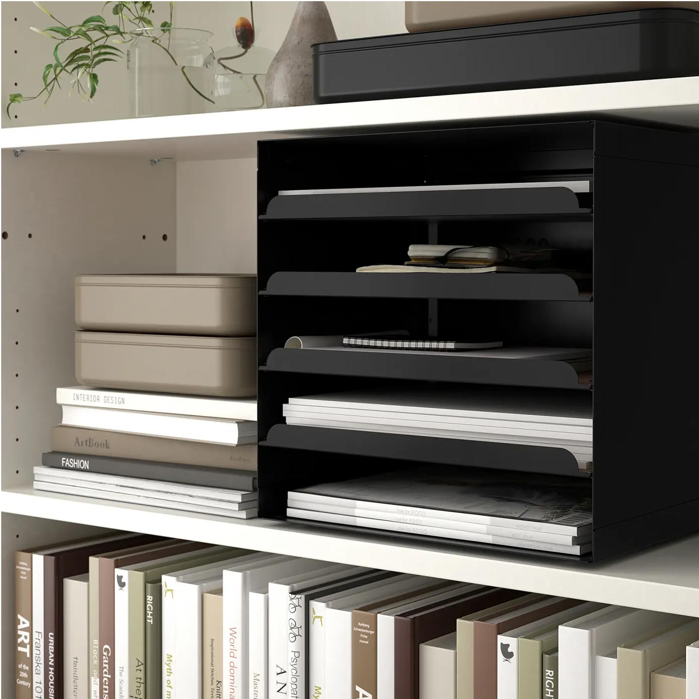 Compact black office file tray with pull-out cork-lined compartments for organised paper and document storage.