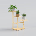Decorative wooden and metal plant stand for succulents indoor plants and modern apartment decoration