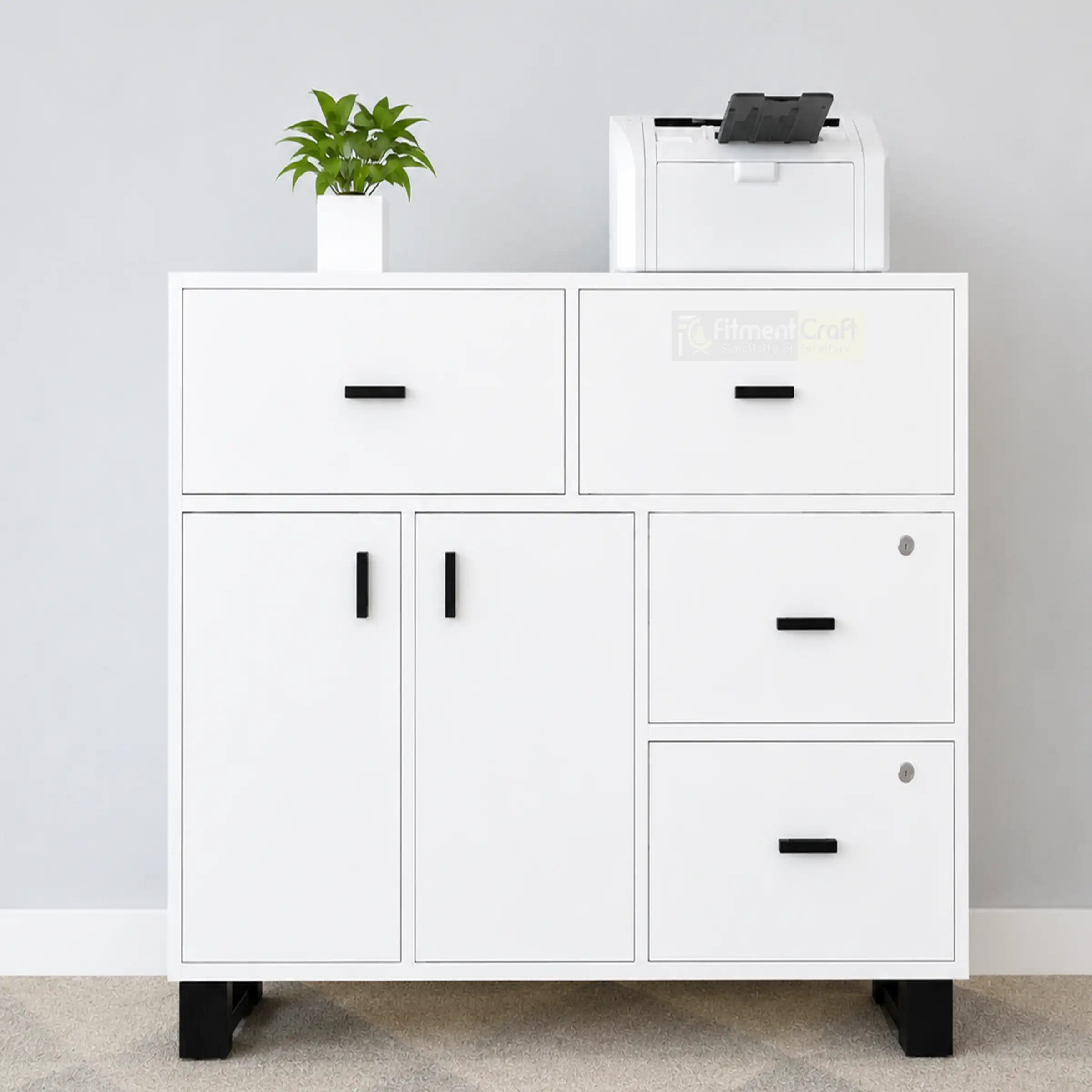 White office file cabinet with multiple drawers, black handles, printer and potted plant