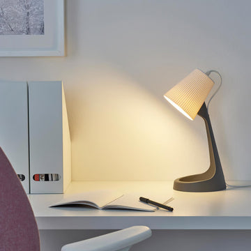 SVALLET Work Lamp black and white modern desk light for reading, study, bedside and workspace use in small spaces.