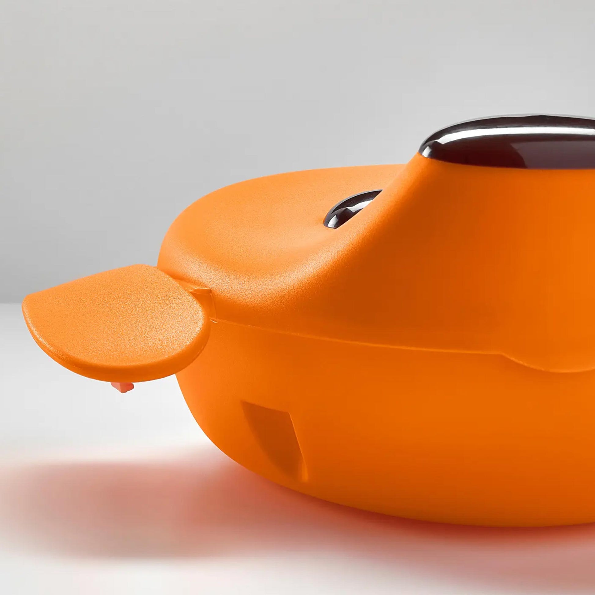 Smaska Lunch Box open with sandwiches and fruit, showing its spacious and kid-friendly design.