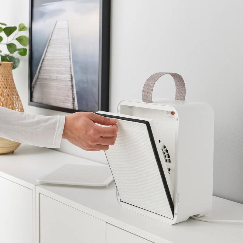 Uppatvind Air Purifier for pollen and dust control with easy carry handle 3 speeds, and compact white body for home use.
