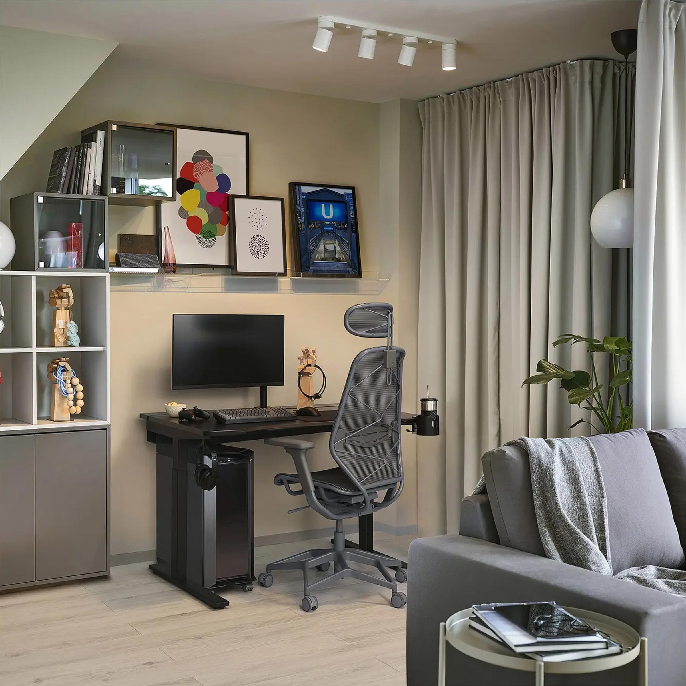 Black Utmaning Gaming Desk with adjustable setup, headset hooks, and tidy cable tray for modern home gaming space in BD.