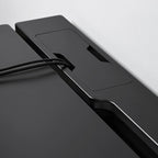 Durable black gaming desk for PC setup with cable management, adjustable frame, and clean workstation design in Dhaka BD