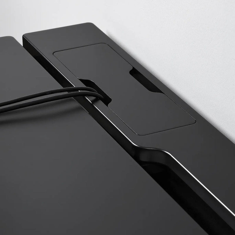 Durable black gaming desk for PC setup with cable management, adjustable frame, and clean workstation design in Dhaka BD
