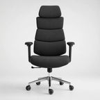 A modern high-back office chair upholstered in black fabric, featuring segmented lumbar support, adjustable armrests, and a chrome five-star base with dual-wheel casters, shown against a light gray studio background.