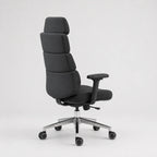 A modern high-back office chair with segmented black fabric padding, a black armrest, and a chrome five-star wheeled base, shown from a three-quarter angle against a light gray background.