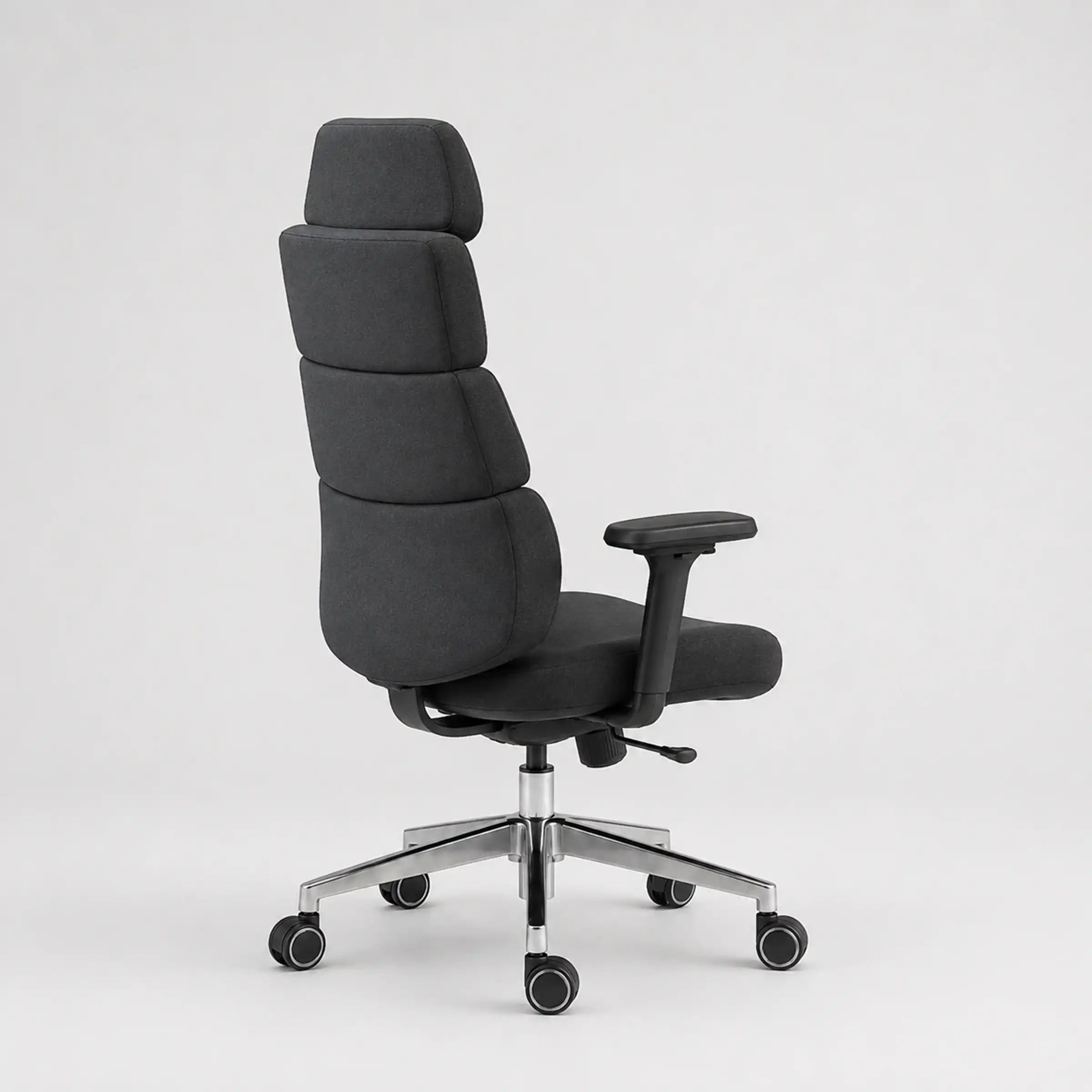 A modern high-back office chair with segmented black fabric padding, a black armrest, and a chrome five-star wheeled base, shown from a three-quarter angle against a light gray background.