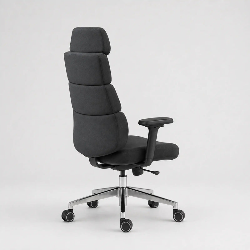 A modern high-back office chair with segmented black fabric padding, a black armrest, and a chrome five-star wheeled base, shown from a three-quarter angle against a light gray background.