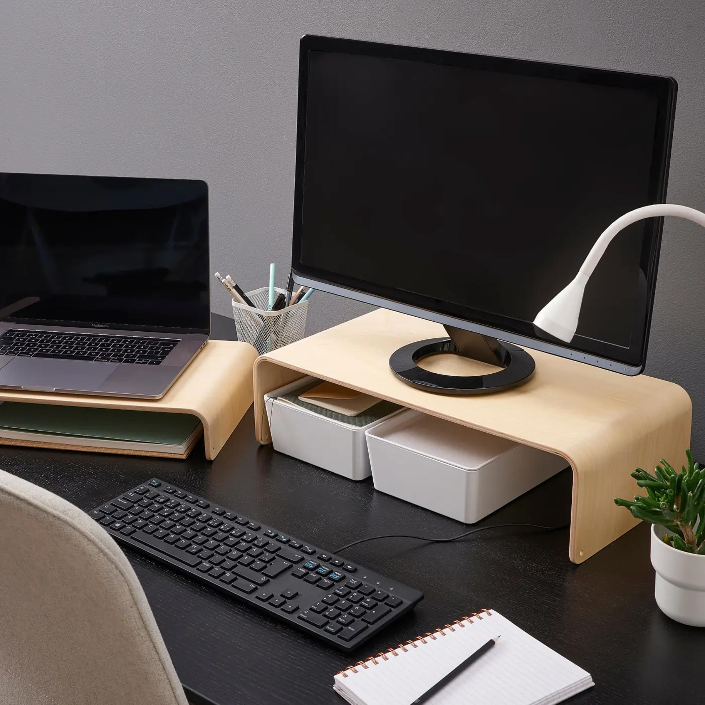 Space saving wooden desk riser for monitor, laptop, keyboard and accessories with natural finish for modern room setups.