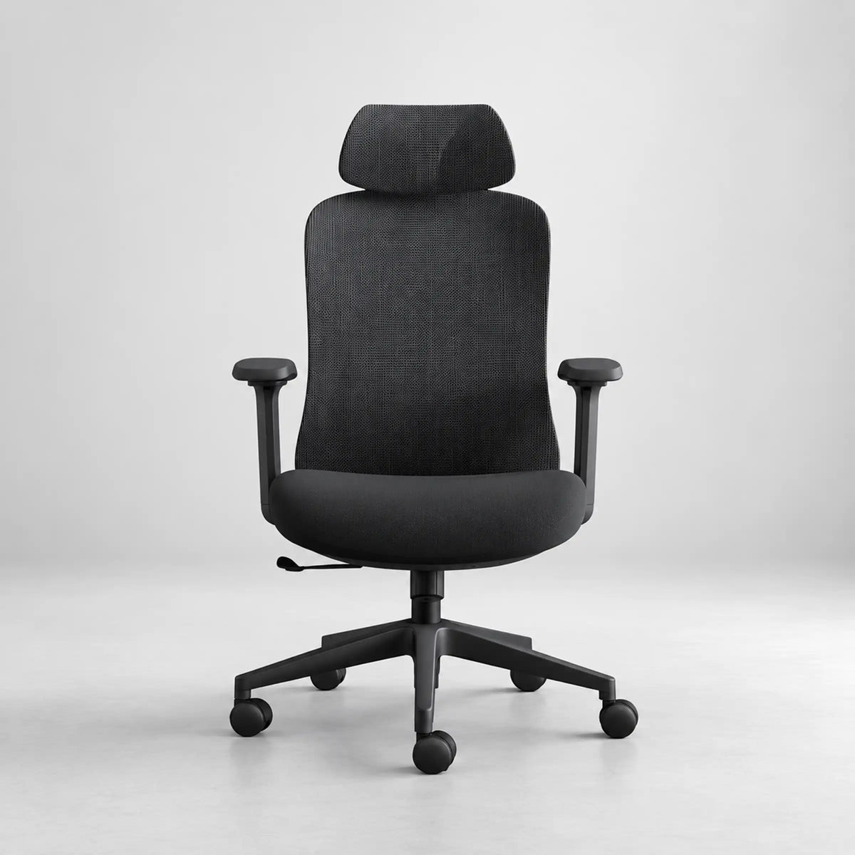 A modern black fabric office chair with a headrest, adjustable armrests, and a five-star wheeled base, shown against a neutral light gray background.