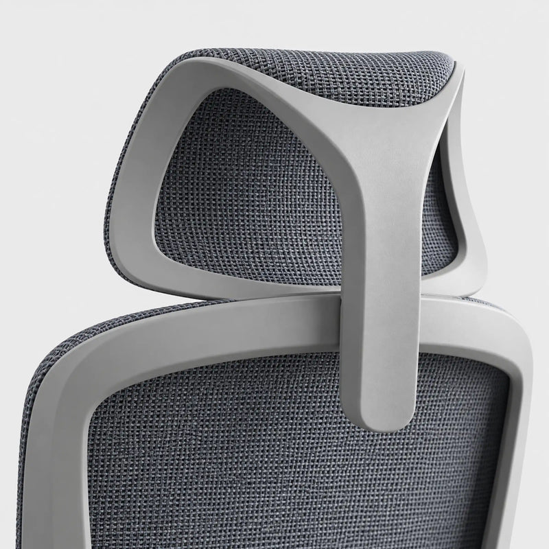 Close-up of an ergonomic office chair showing the headrest and upper backrest with gray textured mesh fabric and a light gray frame.