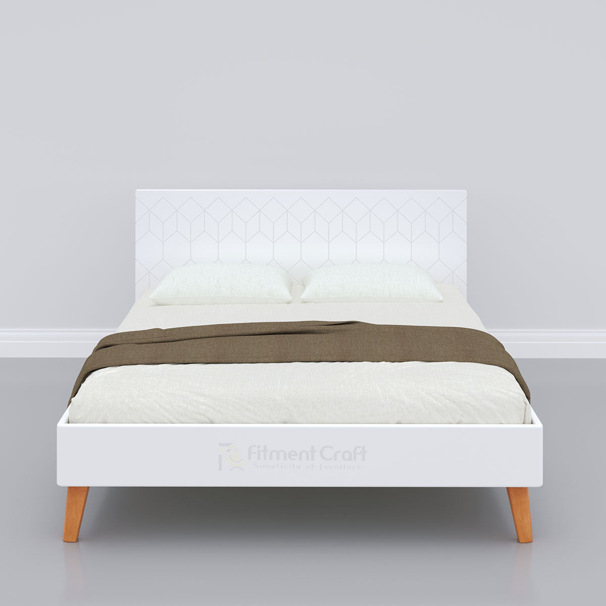 White Astro bed with geometric headboard and brown throw, front view