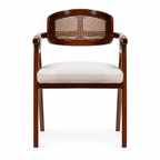 Front view of Auden armchair showing woven back panel, beige cushion and wrapped arms