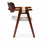 Side profile of Auden lounge armchair showing fixed wood arms, woven wraps and angled legs