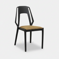 Black Bliss dining chair with open back and brown seat cushion
