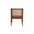 Rear view of Briar Classic wood and PVC rattan lounge chair showing woven back panel and wooden frame