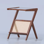 Brown Frostelle side table with slanted frame and woven lower panel, opposite view