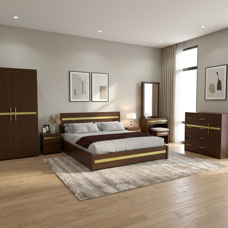 Brown Goldline bed with matching wardrobe, dresser and dressing table in a bedroom