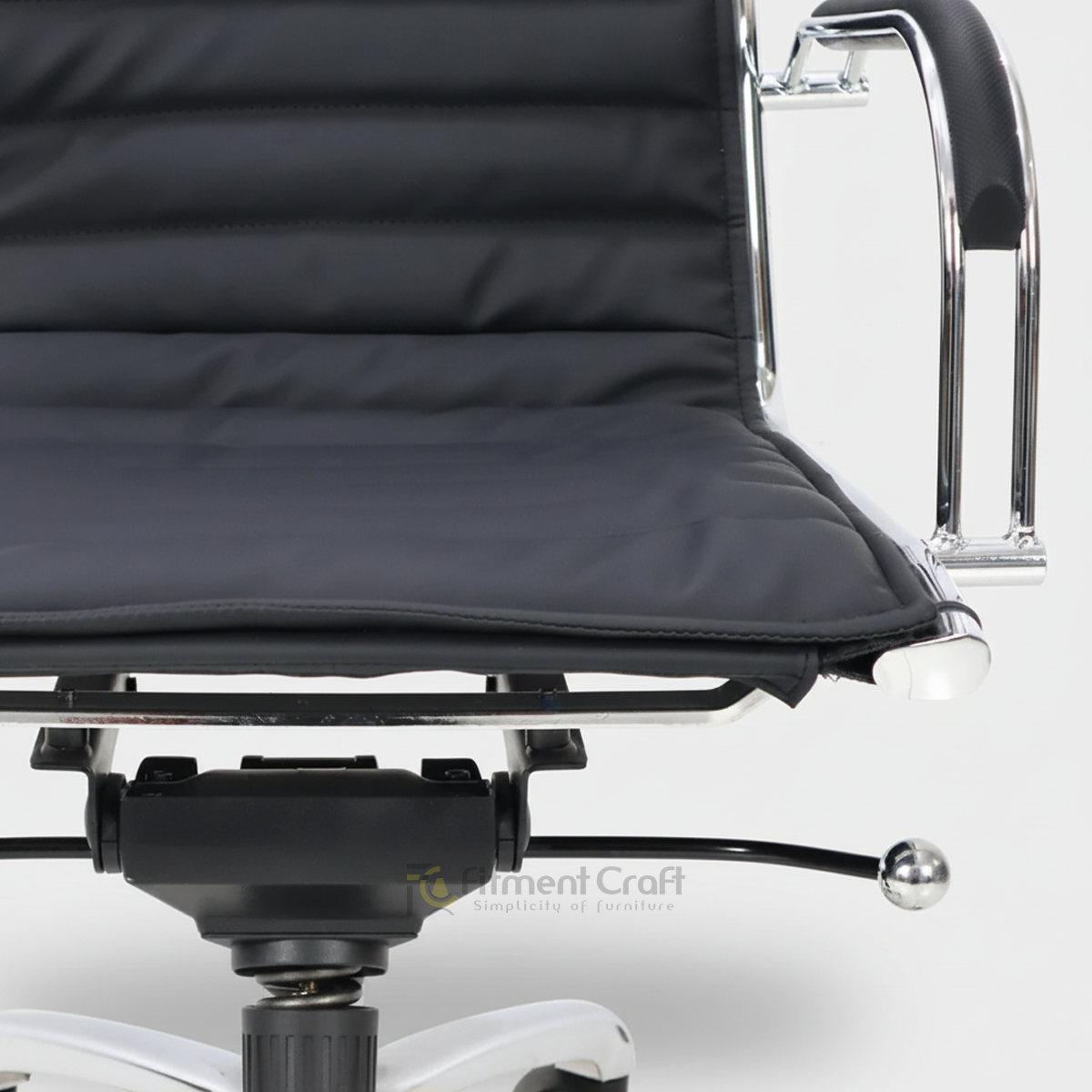 Close view of Confidence chair ribbed seat, armrest and under-seat adjustment mechanism