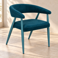 Deep Teal Contour café chair with padded wraparound arms in a quiet café corner