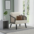 Cream Linora single-seat sofa with black frame and woven side panels beside a window