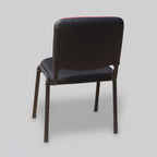 Crux visitor chair with dark padded back and seat, rear angled view