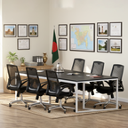 Discuss conference table with black top and white frame surrounded by office chairs