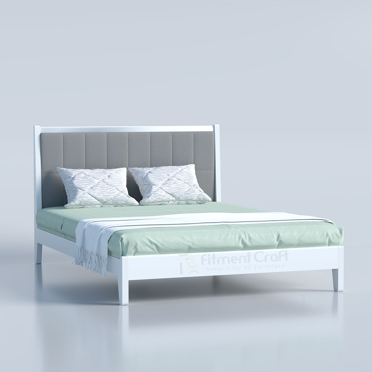 White DreamScape bed with grey upholstered headboard and pale green bedding