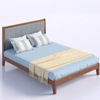 DreamScape bed with grey padded headboard and blue bedding, overhead angled view