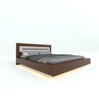 Brown Farzen platform bed with pale inset headboard and grey bedding, angled view
