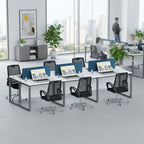 Flexi six-person workstation with blue dividers, laptops and black chairs in an office