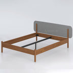 Hauser bed frame without mattress showing grey padded headboard and central support rails