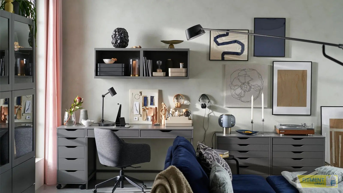 HÖGVIND table lamp on a cabinet in a home workspace