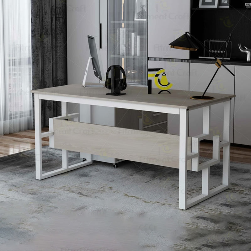 Light wood-tone Aristocrat executive desk with computer and lamp in an office