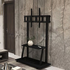 Black Majestic TV stand with mounting bracket and lower shelf beside a wall