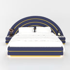 Navy Harlo bed front view with arched gold-trimmed headboard and bedside cabinets