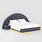 Navy Harlo bed with arched gold-trimmed headboard and white bedding, angled view
